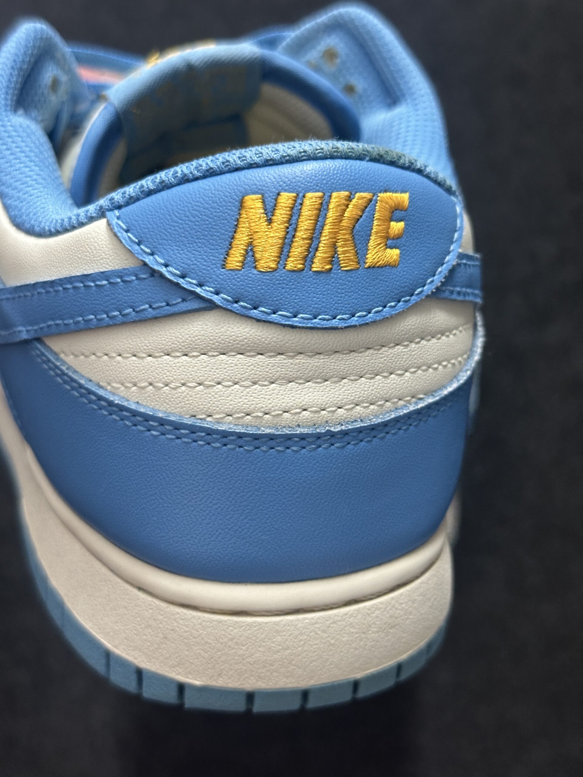 Nike Dunk Low Coast DD1503-100 taglia EU 45 vista logo